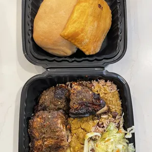 Jerk Chicken entree with Coco Bread and Beef Patty
