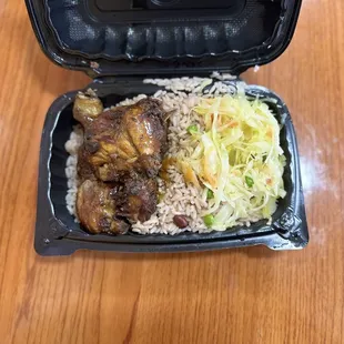 I went with the lunch special Fricassee (Brown Stew) Chicken,rich Rice and Peas, and Steamed Cabbage