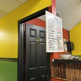 a menu hanging from the ceiling