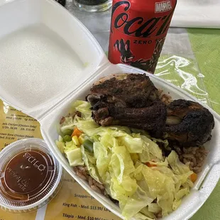 $10 lunch special Jerk chicken, oxtail gravy over rice with cabbage. Comes with can of soda. Perfect size.