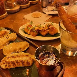 Gyoza, crispy rice and Leche de tigre ( $9 each on happy hour