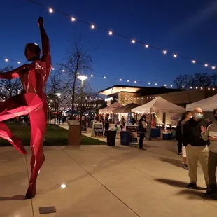 a statue of a woman dancing