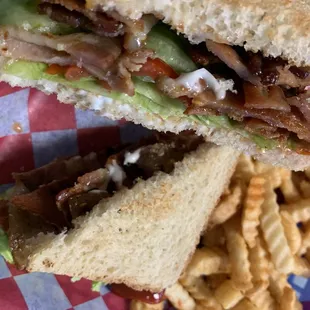 My BLT, lots of bacon, but some was undercooked.