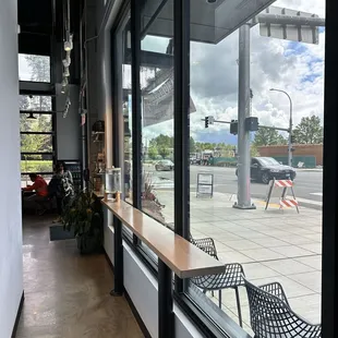 Side view from the cafe, additional chairs outside for guests