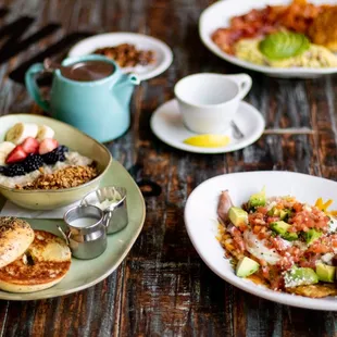 plates of food on a wooden table