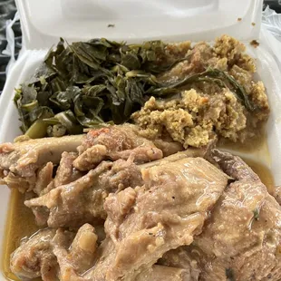 Smothered turkey wings, dressing and greens.