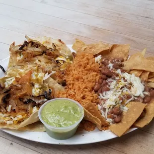 Huevos rancheros with rice and beans