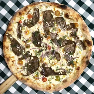 Rotating Pizza Lab: &quot;Gyro Hero&quot;

Tzatziki sauce base with aged mozz, lamb &amp; beef gyros, heirloom tomato, pickles, red onion, feta &amp; dill.