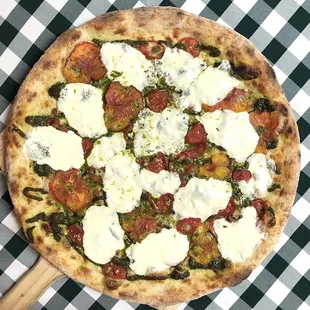 Rotating Pizza Lab: &quot;Treasured Heirloom&quot;

Pistachio pesto base with fresh mozzarella and heirloom tomatoes.