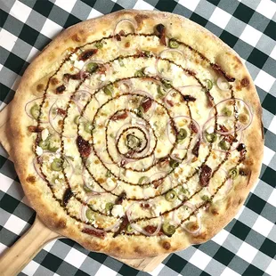 Rotating Pizza Lab: &quot;The Greek&quot;

White sauce base with green olive, sun dried tomato, red onion, feta &amp; balsamic glaze.