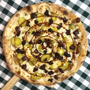 Rotating Pizza Lab: &quot;Backyard BBQ&quot;

BBQ sauce base with aged mozz, brisket burnt ends, sweet onion and dill pickle chips.