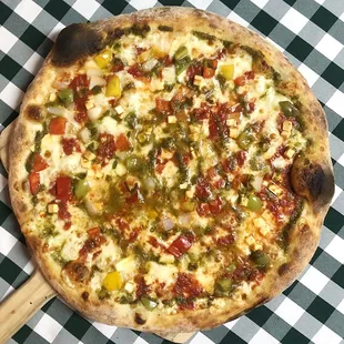 Rotating Pizza Lab: &quot;Chili Paneer&quot;

Masala red sauce base with aged mozz, chili paneer, bell pepper, onion, &amp; finished with green curry.