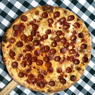Rotating Pizza Lab: &quot;The Funky Pep&quot;

Red sauce base with aged mozz and Gorgonzola cheeses, sauerkraut, biquinho peppers and pepperoni.