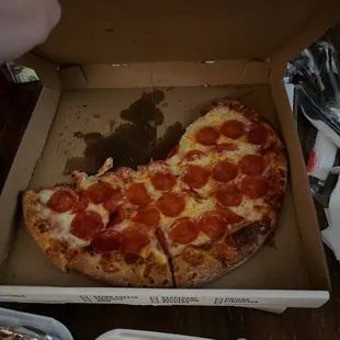 a slice of pepperoni pizza