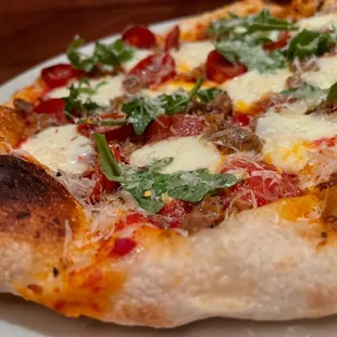 a small pizza on a plate