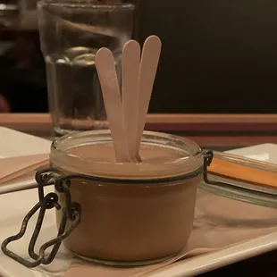 a plate of food and a glass of water