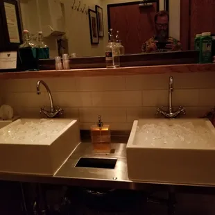 two sinks in a public restroom