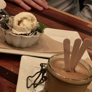 a bowl of ice cream and a spoon with a spoon sticking out of it