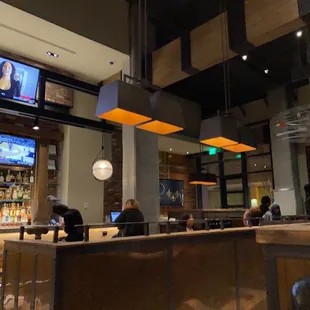 people sitting at the bar