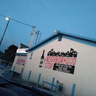 a white building with a sign on it