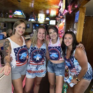 Bartenders dressed up in 4th of July attire for the Annual Neighborly Bar Summer Party.