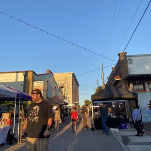 a man standing in the middle of the street