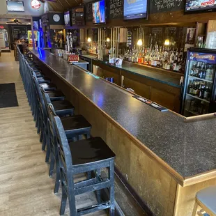 a bar with a lot of seating