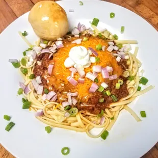 Cincinnati Chili served with a dinner roll