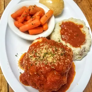 Chicken Parmesan Stuffed Red Pepper. Served with Mashed potatoes, Red Sauce, Baby Carrots, Roll and butter