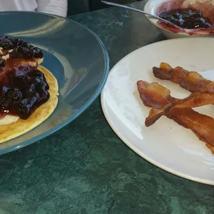 Banana/blueberry pancakes and side of bacon.