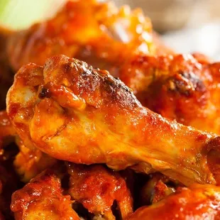 a plate of chicken wings