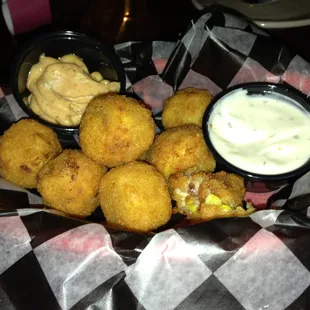 Cowboy Bites - "corn breaded goodness". Pepper jack cheese, jalapeños, bacon.  A nice blend of everything bad for you!