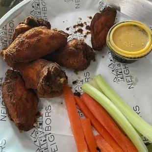 1/2 order of hot dry rub smoked chicken wings with garlic parmesan dipping sauce