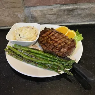 a steak and asparagus