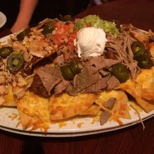 Nachos to share. A lot of meat but subpar in flavor.