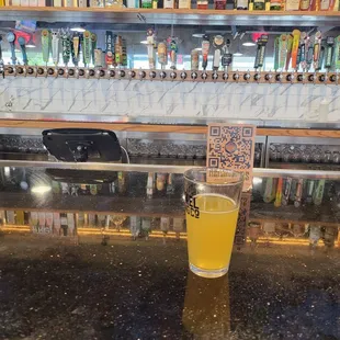 The selection of beers are quite a . Staff especially the bartenders are awesome.  The mixed drinks are also well made. Friendly staff.
