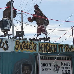 two men on top of a building