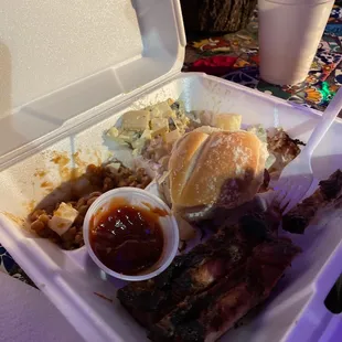 Ribs beans and potato salad with Mac and cheese