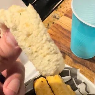 What in God&apos;s name is this? Frozen mozzarella sticks that look like white dog turds. Disgusting and unsafe to eat.