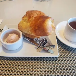 a croissant and a cup of tea