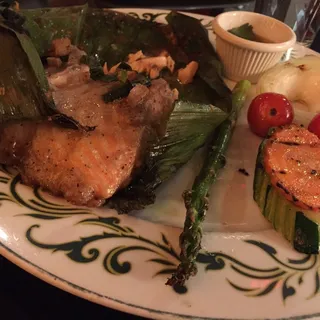 Grilled salmon in Banana leaves