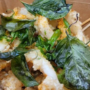 Squid rings, lightly breaded and delicately cooked.  Delicious.