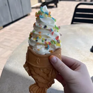 Taiyaki Cone with Vanilla Soft Serve topped with Fruity Peebles and Sweetened Condensed Milk.