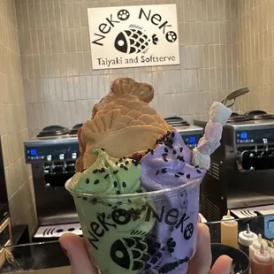 Ube-Matcha Cup Cone is ith Sesame and Mochi Topping ($7.50)