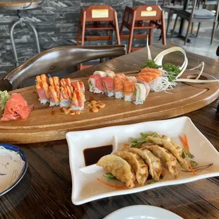 Gyoza, Rainbow Roll, Salmon Sashimi, and Kiss of Fire