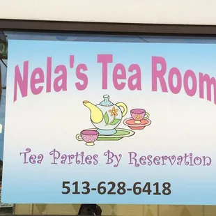 sign for nela's tea room