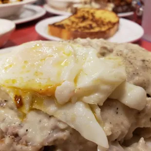 Chickenfried steak with overeasy eggs on top.