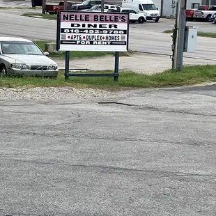 a sign in a parking lot