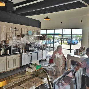 a woman serving a customer