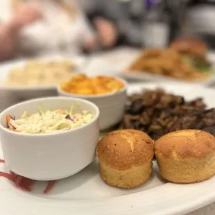 Cornbread, coleslaw, Mac and cheese, pulled pork